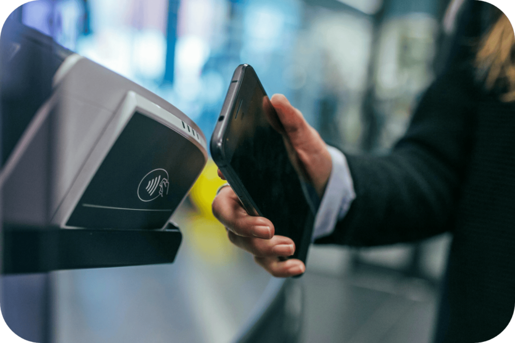 Retail cashier processing a secure transaction using FastoSafe’s AI-driven POS fraud prevention system.